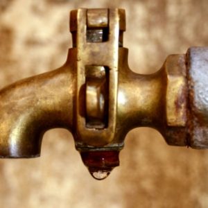 A tap dripping water