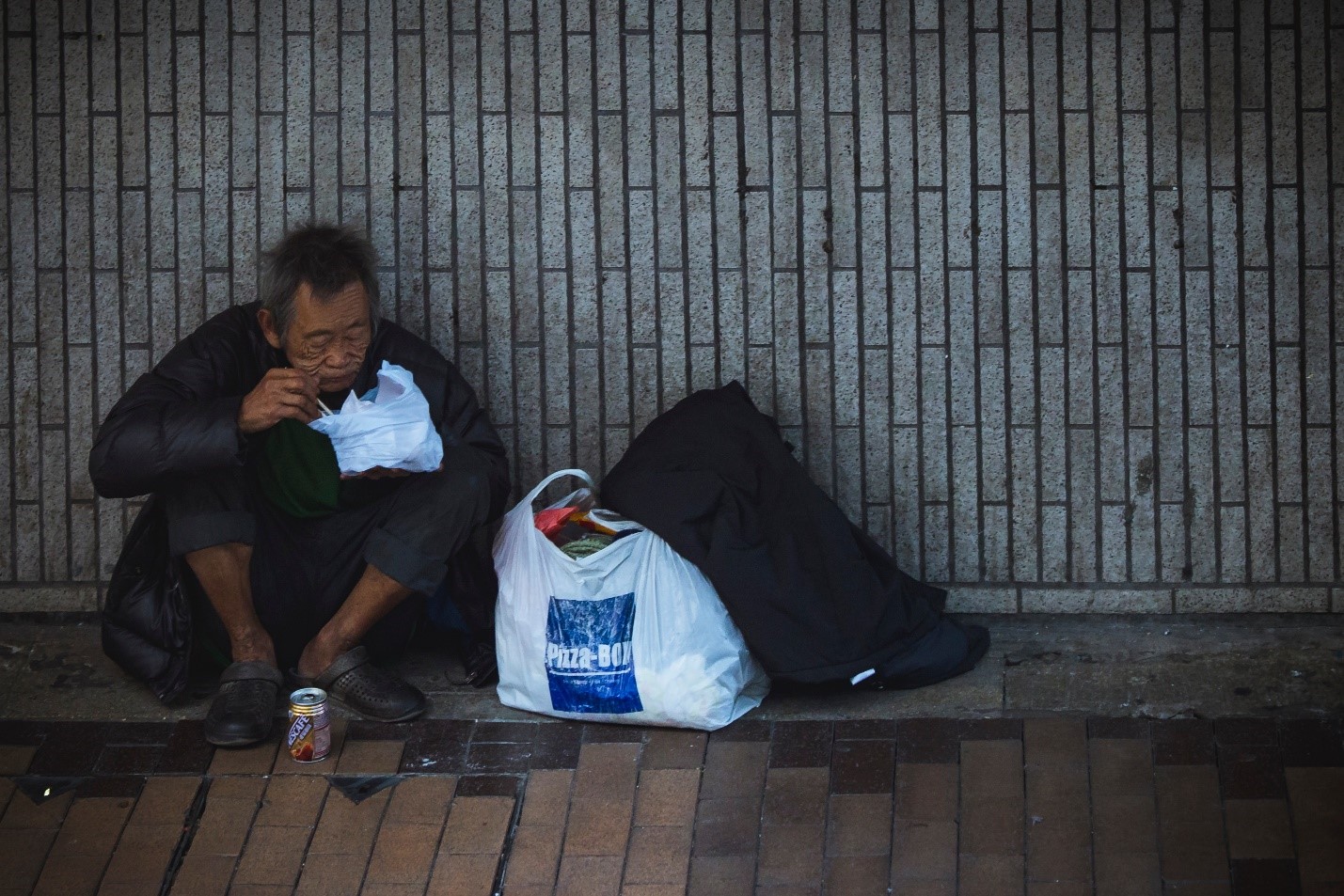 a homeless person having a meal