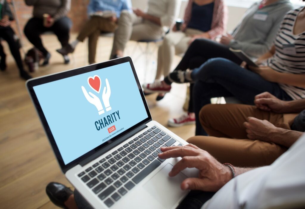 a laptop illustrating a charity exercise