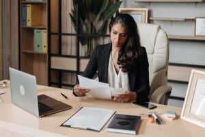 a woman going through a public procurement document